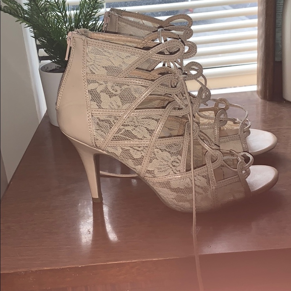 Nude lacey, lace up heels.